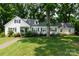 Charming single-story home with a well-manicured lawn, mature trees, and inviting curb appeal at 613 E Ridge St, Kings Mountain, NC 28086