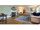Bright living room with hardwood floors, a fireplace, and comfortable seating arrangement at 613 E Ridge St, Kings Mountain, NC 28086