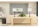 Stylish living room with neutral tones, modern furniture, a large TV, and decorative lamps at 6364 Fairfax Ct, Maiden, NC 28650
