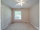 Comfortable bedroom with a view and cozy atmosphere at 6416 Wilgrove Mint Hill Rd, Mint Hill, NC 28227