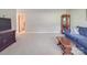 Cozy living room with neutral carpet and ample space at 6416 Wilgrove Mint Hill Rd, Mint Hill, NC 28227