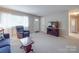 Spacious living room with a large window and plenty of natural light at 6416 Wilgrove Mint Hill Rd, Mint Hill, NC 28227