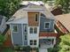 Aerial view of modern two-story home with gray and white facade and balcony at 708 Cross Trail Dr, Charlotte, NC 28204