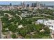 Aerial view of the cityscape with tree covering, roads and residential buildings at 708 Cross Trail Dr, Charlotte, NC 28204