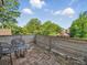 A cozy wood-floored balcony with comfortable seating offers a relaxing outdoor retreat at 708 Cross Trail Dr, Charlotte, NC 28204