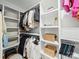 Well-organized walk-in closet with shelving, hanging rods, and ample storage space at 708 Cross Trail Dr, Charlotte, NC 28204