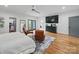 Spacious main bedroom featuring hardwood floors, sitting area, and walk-in closet at 708 Cross Trail Dr, Charlotte, NC 28204