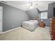 Comfortable bedroom with a full bed, ceiling fan, and ample natural light at 733 Killian Rd, Stanley, NC 28164