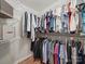 Walk-in closet with ample hanging and shelving space at 733 Killian Rd, Stanley, NC 28164