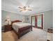 Serene main bedroom with a ceiling fan and private access to the backyard at 733 Killian Rd, Stanley, NC 28164