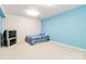 Finished basement bedroom painted with accent wall at 7704 Ninth Fairway Ln, Mint Hill, NC 28227