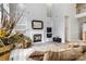 Cozy living room with fireplace, built-in shelving, and modern decor at 7704 Ninth Fairway Ln, Mint Hill, NC 28227