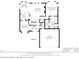 Detailed floor plan showcasing main level layout featuring living room, garage, and primary bedroom at 7704 Ninth Fairway Ln, Mint Hill, NC 28227