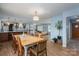 Open concept with view of kitchen, living room, and dining room, highlighted by wooden floors and modern decor at 810 Surry Dr, Shelby, NC 28152