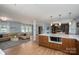 Open concept living area with light blue walls, hardwood floors, modern decor and lots of natural light at 810 Surry Dr, Shelby, NC 28152