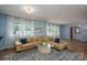 Cozy living room featuring a large sectional couch and bright natural light at 810 Surry Dr, Shelby, NC 28152