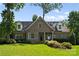 Charming brick home with a manicured lawn and beautiful landscaping at 901 Hartford Ave, Charlotte, NC 28209