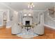 Inviting living room with a fireplace and stylish decor at 901 Hartford Ave, Charlotte, NC 28209