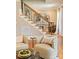 Comfortable seating in a living area with staircase at 901 Hartford Ave, Charlotte, NC 28209