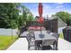 Outdoor living with a spacious deck, seating, and dining area at 10012 Michael Crossing Dr, Charlotte, NC 28213