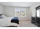 Bedroom featuring neutral walls, carpet, and a dresser at 10012 Michael Crossing Dr, Charlotte, NC 28213