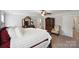 Cozy primary bedroom with furniture, a bed, and soft carpet at 10012 Michael Crossing Dr, Charlotte, NC 28213