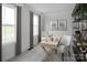 Bright home office featuring a desk, comfortable seating, and ample natural light at 10112 Florentine Ln, Charlotte, NC 28214