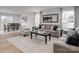 Open concept living room and dining area with neutral decor, providing a cozy and inviting space at 10112 Florentine Ln, Charlotte, NC 28214