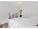 Bright bedroom features hardwood floors, closet, and built-in storage at 107 Glenmont Ct, Mooresville, NC 28117