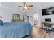 Comfortable bedroom with hardwood floors and lots of natural light at 107 Glenmont Ct, Mooresville, NC 28117