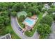 Overhead image of community pool with playground, tennis court and parking at 107 Glenmont Ct, Mooresville, NC 28117