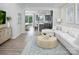 Open concept living room featuring stylish decor, modern furniture, and lots of natural light at 11034 Engelmann Ln, Charlotte, NC 28269