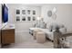 Cozy loft featuring a comfortable sofa, stylish decor, and lots of natural light at 11034 Engelmann Ln, Charlotte, NC 28269
