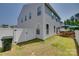 Spacious fenced backyard with patio deck offering outdoor relaxation and entertainment possibilities at 1195 Cavalier Ln, Rock Hill, SC 29730