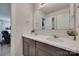 Bathroom features a double sink vanity with modern faucets, framed mirrors and a tiled countertop at 1195 Cavalier Ln, Rock Hill, SC 29730
