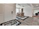Elegant dining area featuring wood floors, stylish rug, and modern lighting fixture at 1195 Cavalier Ln, Rock Hill, SC 29730