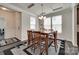 Bright dining room with a wooden table, chair set and recessed ceiling lighting at 1195 Cavalier Ln, Rock Hill, SC 29730