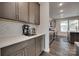 Modern kitchen with quartz countertops, subway tile backsplash, and stainless steel appliances at 1195 Cavalier Ln, Rock Hill, SC 29730