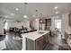 Spacious kitchen features stainless steel appliances, island with barstool seating, and stylish finishes at 1195 Cavalier Ln, Rock Hill, SC 29730