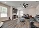 Living room featuring a stone fireplace, ceiling fan, and comfortable seating at 1195 Cavalier Ln, Rock Hill, SC 29730