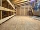 Unfinished attic, wood flooring and ceiling beams at 1195 Winding Creek Rd, Salisbury, NC 28146