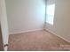 Bedroom featuring carpeted floors, one window and painted walls at 1195 Winding Creek Rd, Salisbury, NC 28146