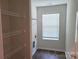 Laundry room has window and shelving at 1195 Winding Creek Rd, Salisbury, NC 28146