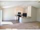 Bright living area features a modern kitchen with stainless appliances and natural light at 1195 Winding Creek Rd, Salisbury, NC 28146