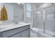 Modern bathroom with white countertops and a glass-enclosed shower at 12024 John Newton Dr, Davidson, NC 28036