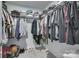 Walk-in closet featuring ample storage and organization space at 12024 John Newton Dr, Davidson, NC 28036