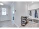 Bright foyer with a coat rack and convenient shoe storage at 12024 John Newton Dr, Davidson, NC 28036