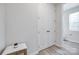 Bright hallway features a double door closet and leads to a bathroom at 12024 John Newton Dr, Davidson, NC 28036