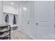 Hallway with closet storage space and a shoe rack at 12024 John Newton Dr, Davidson, NC 28036