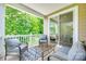 Inviting patio space with cozy furniture and a serene outdoor ambiance at 12024 John Newton Dr, Davidson, NC 28036